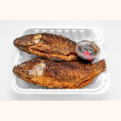 Whole fried tilapia with dipping sauce